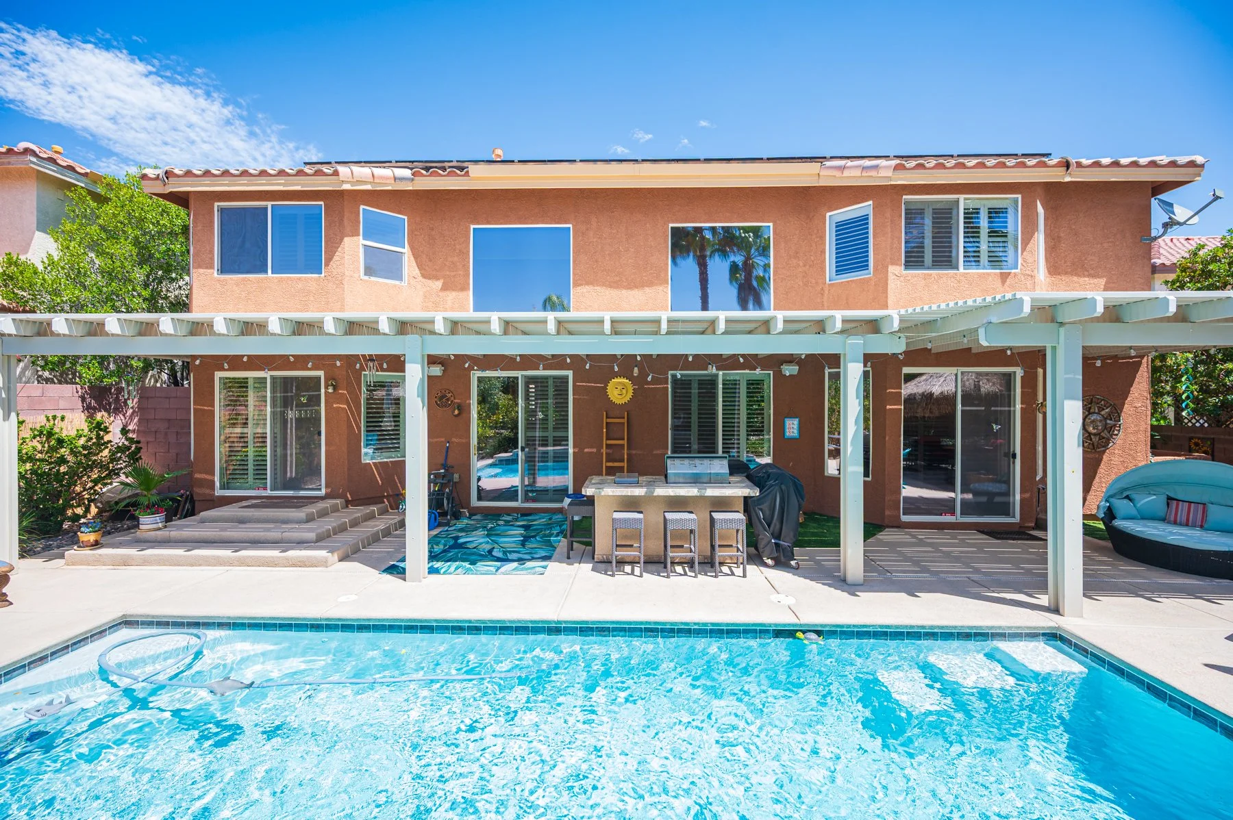 Rear elevation and pool at 6365 Mighty Flotilla Avenue