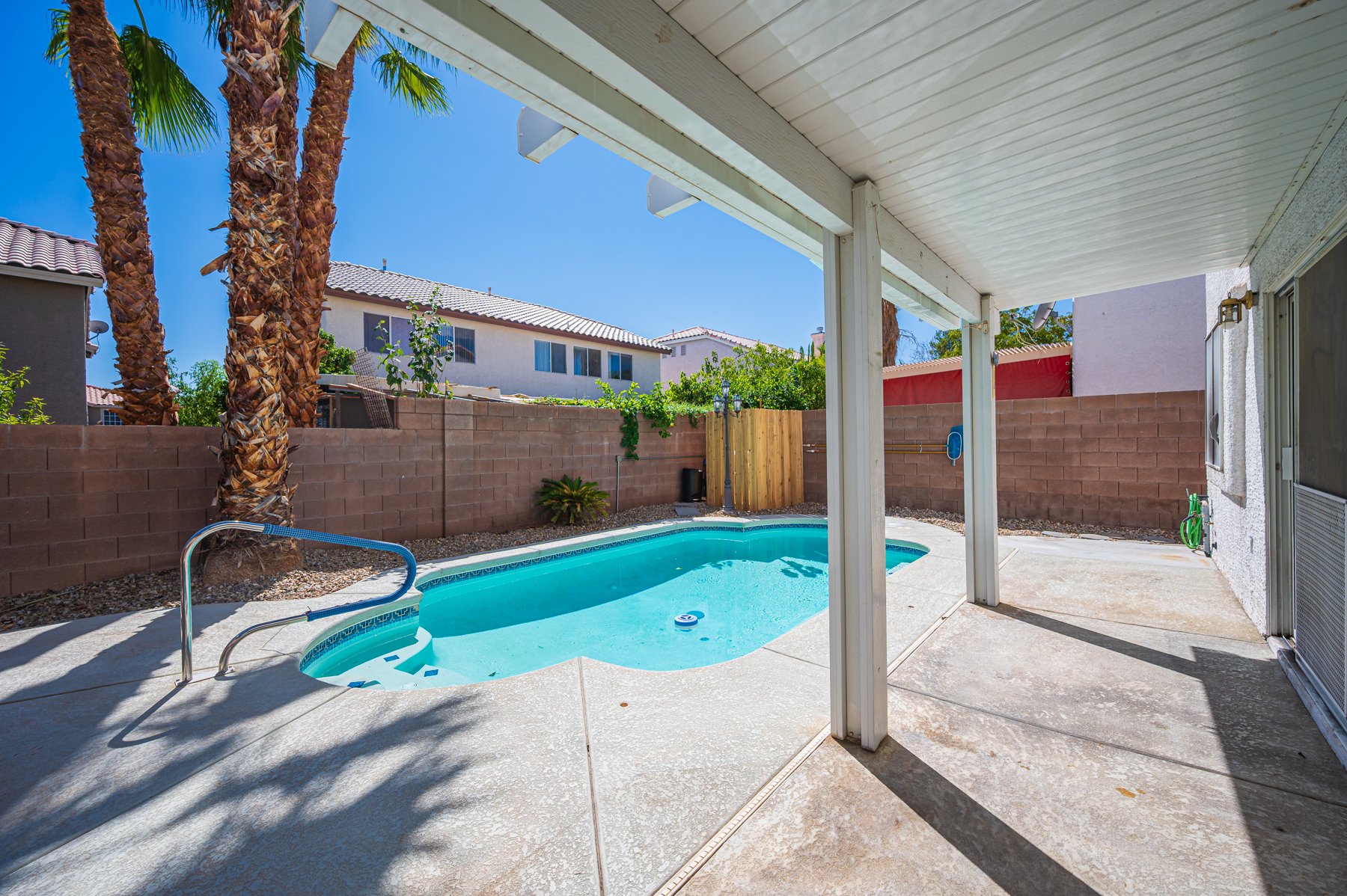 Swimming pool seen from the covered patio