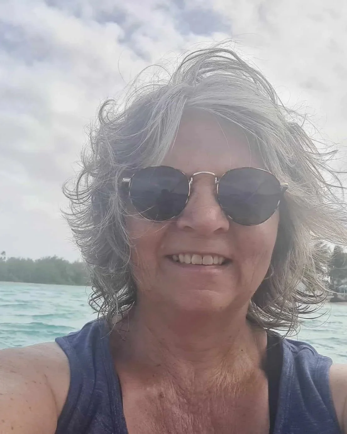 a photo of Vikki Ambrose out on a boat in the sun