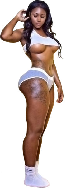 A young woman with long, dark, wavy hair standing in a casual pose, wearing a white crop top, ripped light-colored shorts, and white socks.