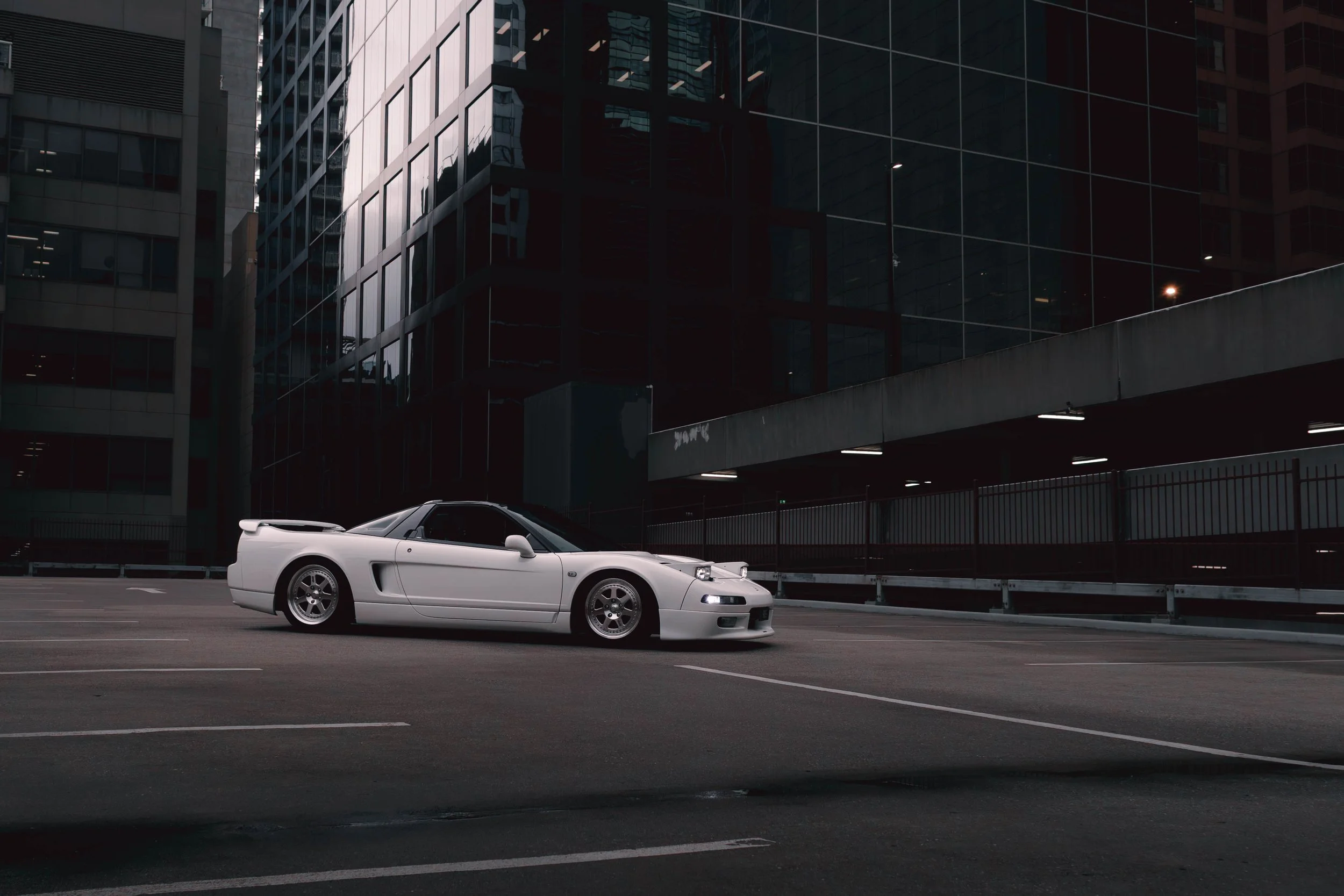 A white Honda NSX car with full Mugen catalogue