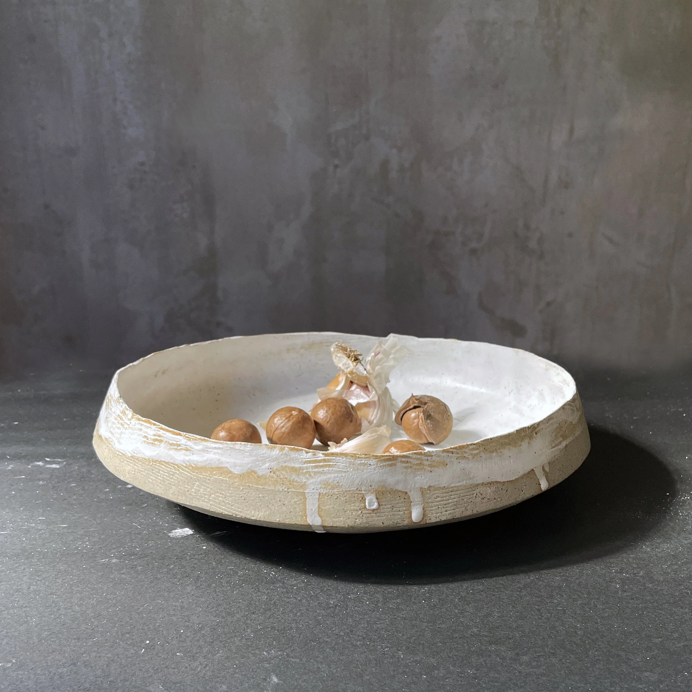 Large handbuilt raku serving bowl