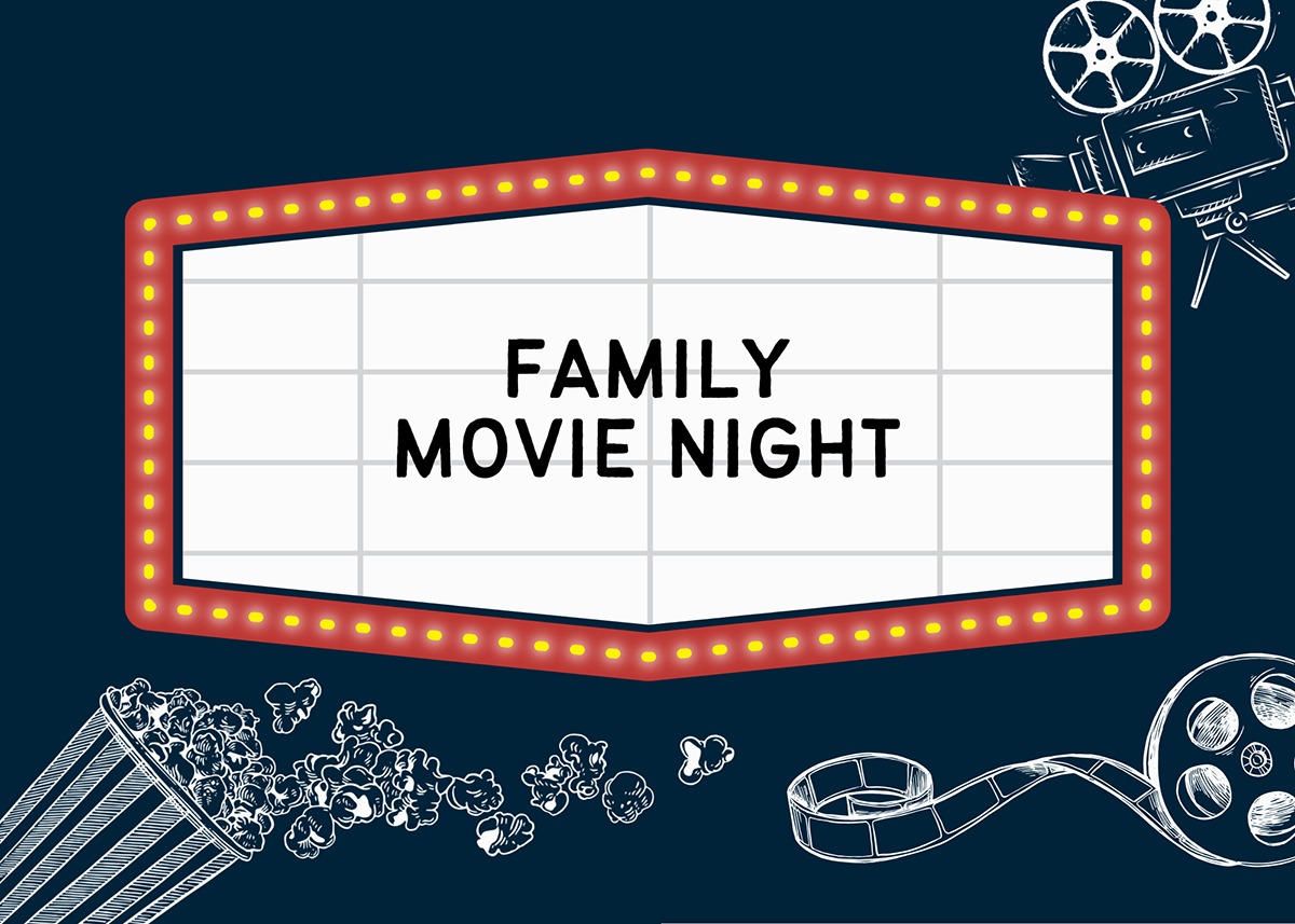 Group of teenagers sitting in a circle, engaging in a discussion or activity in a casual indoor setting with wall signs and hanging lights.