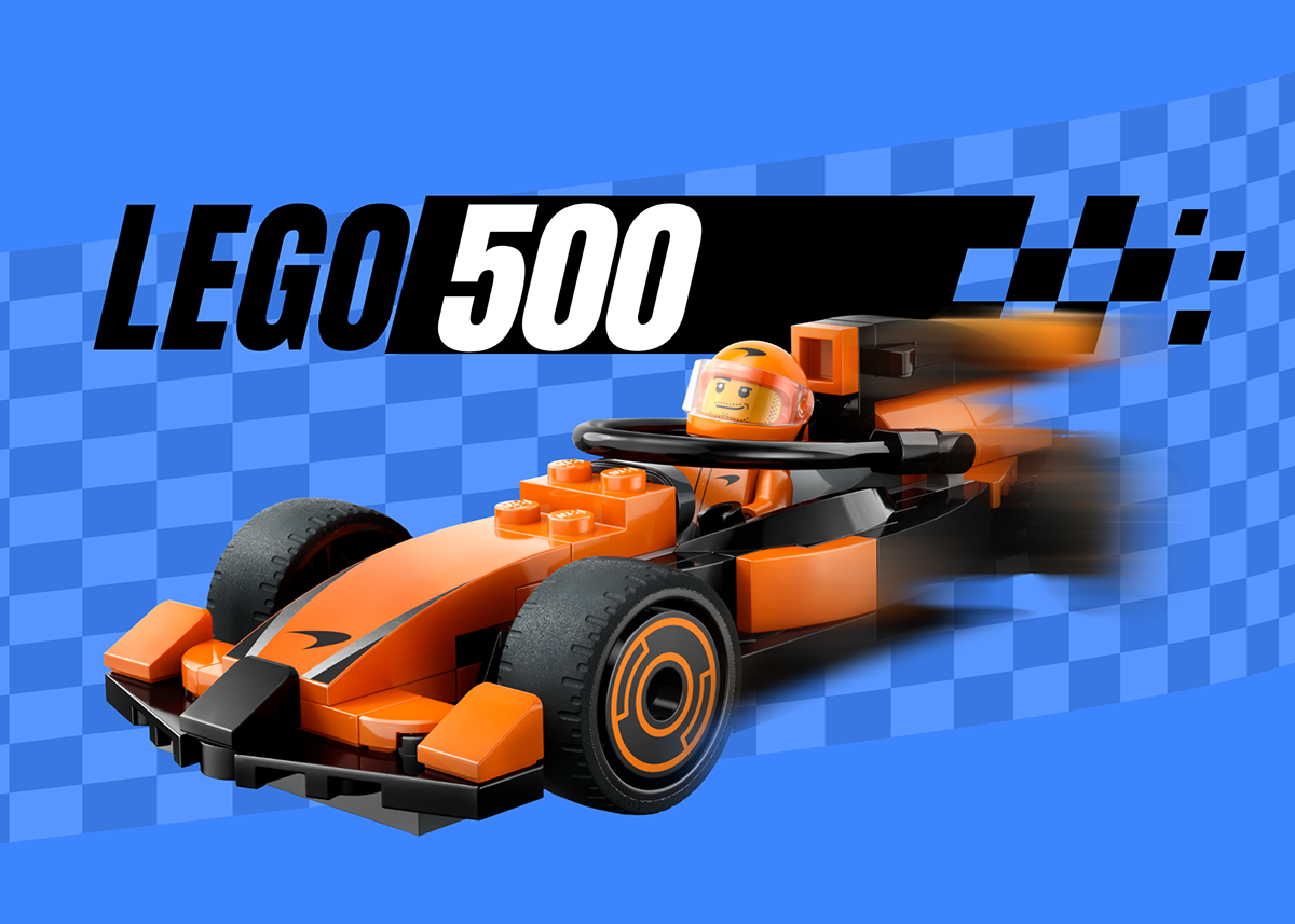 A group of young children and an adult woman playing with toys at a table in a classroom or playroom.