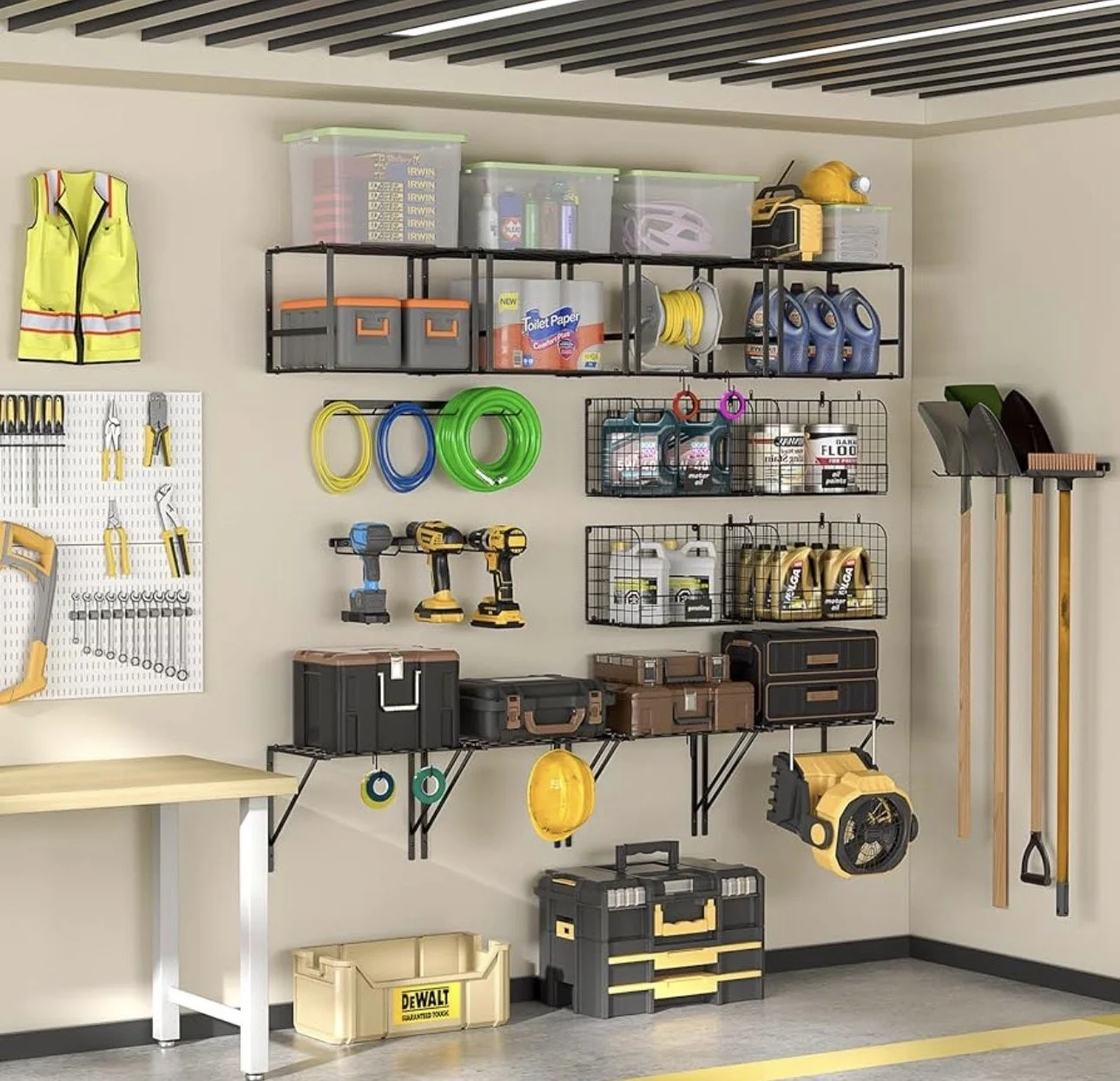Well-organized garage storage with tools, containers, hoses, drills, and yard equipment on wall-mounted shelves, hooks, and pegboards.