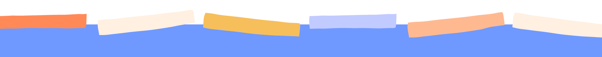 Close-up of colorful paper strips arranged in a line with a black background.