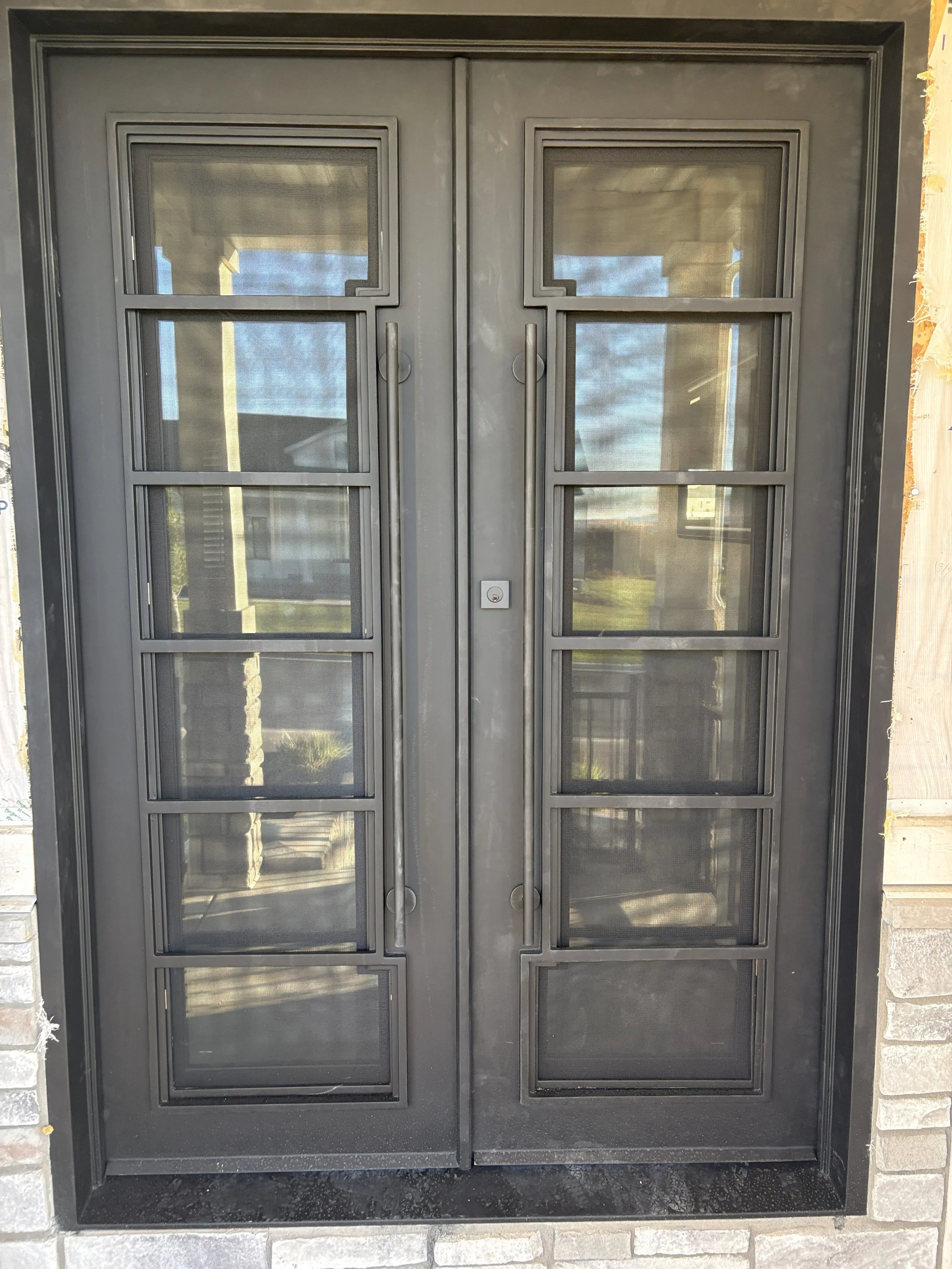 Iron French door entry installation in Salt Lake County