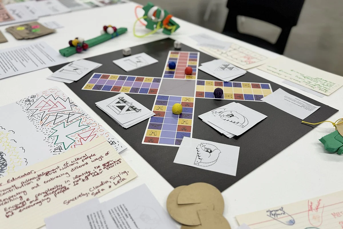 Board game and archival material on a table