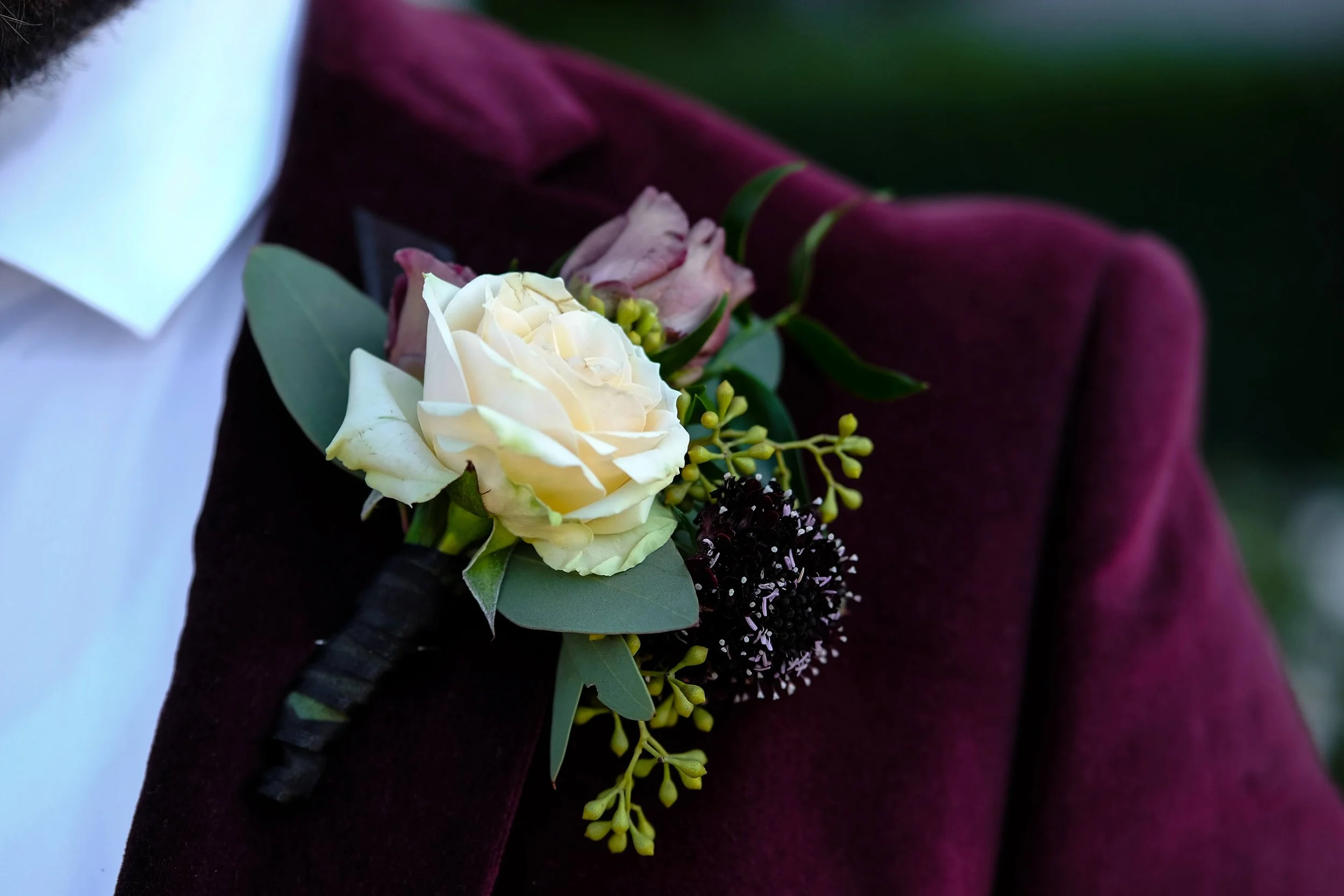 maroon and white groom boutonniere by Wild Spirit Floral