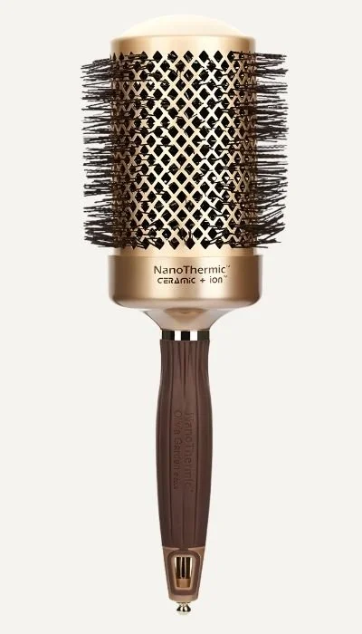 A ceramic and ion hair styling brush with a metal patterned exterior and a brown handle.