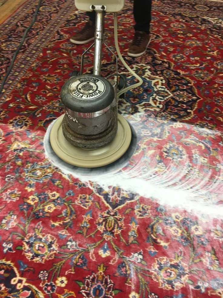 Washing Rug at AAA rug repair.jpg