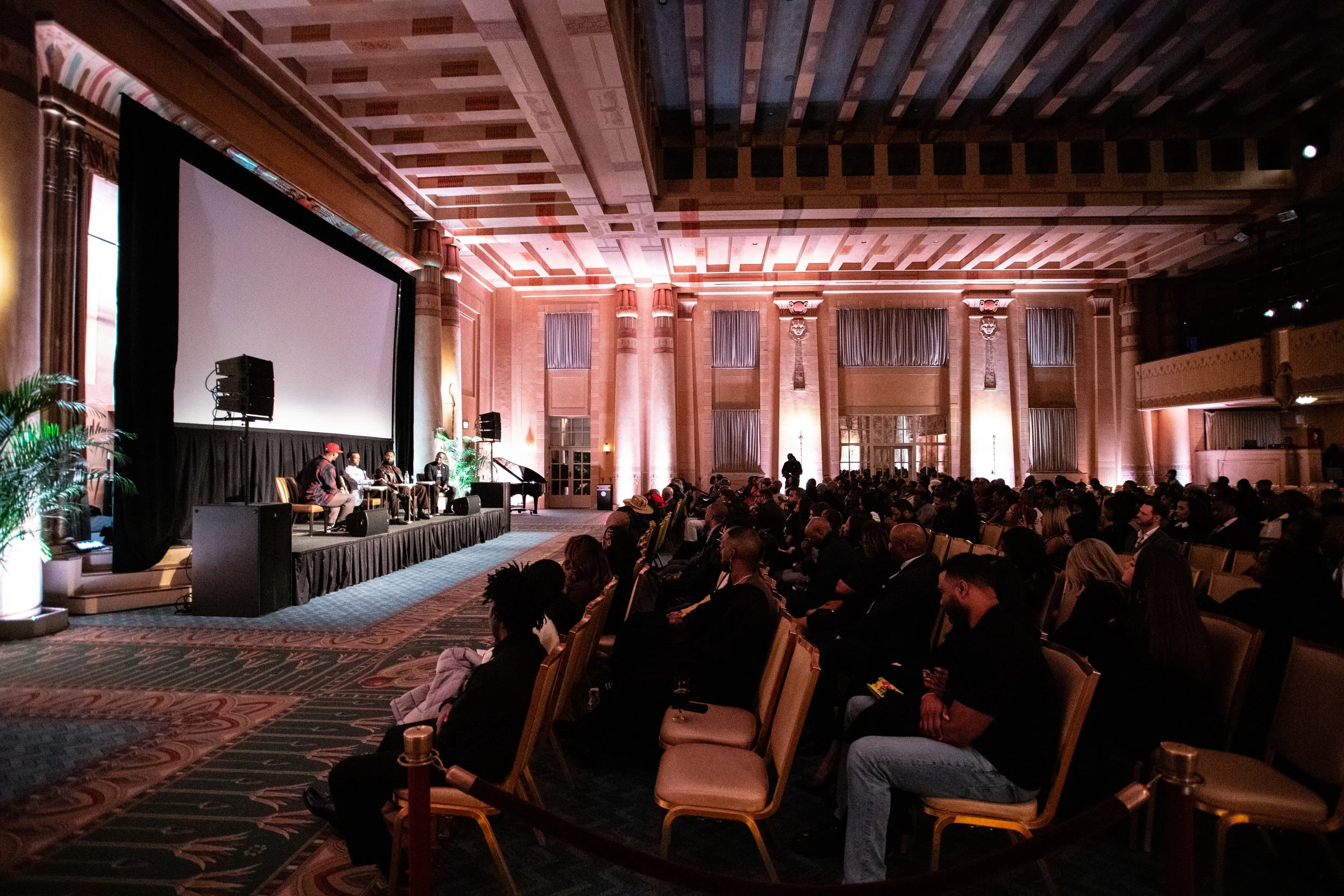 Community members attending private screening event