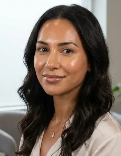 Aesthetic practitioner discussing post-procedure aftercare protocol with patient