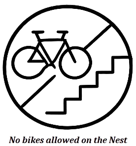 A black and white bicycle sign with the text 'No bikes allowed on this path' underneath.