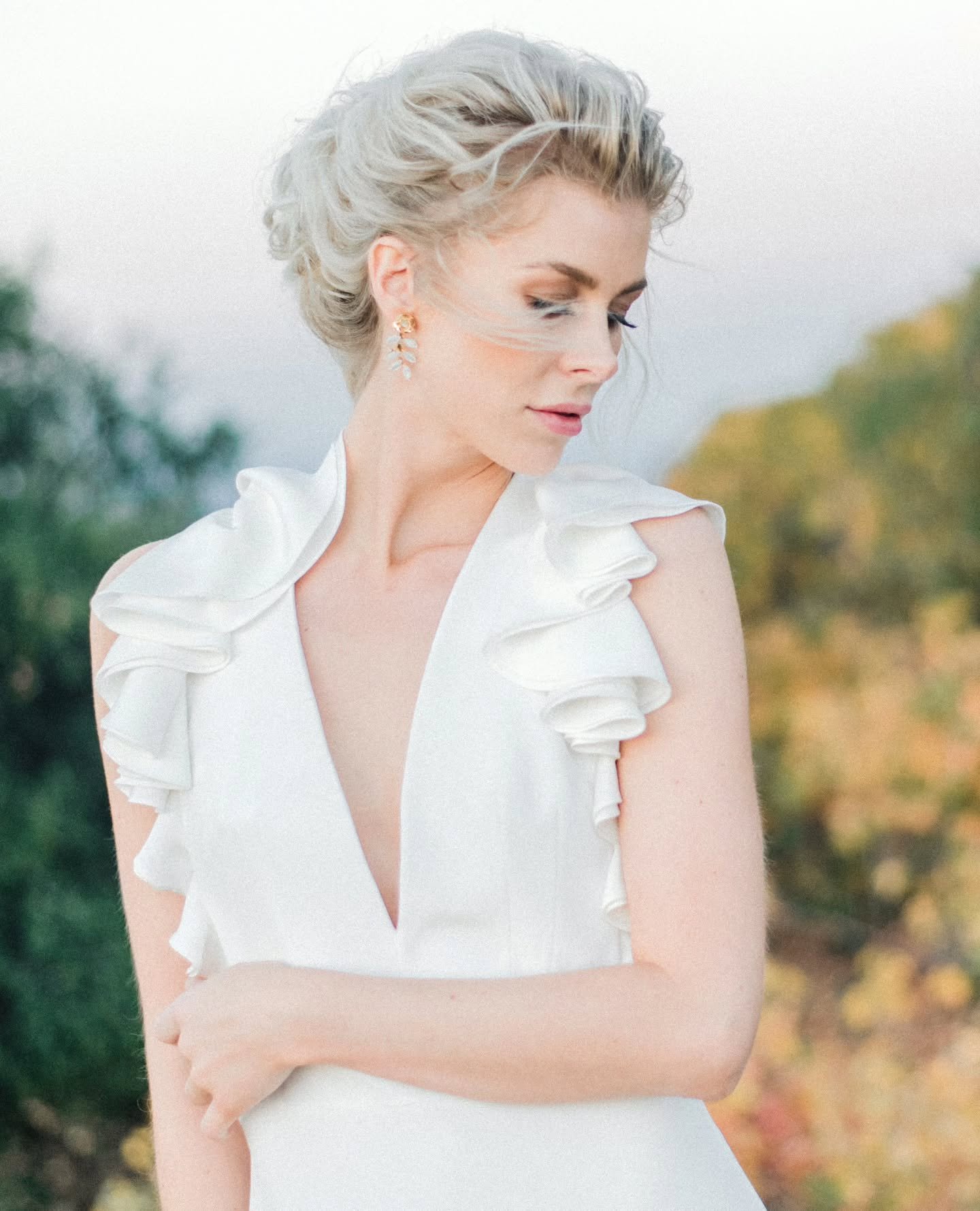Wind tangled hair, soft light, and a dress that moved with every step. Effortless, undone, and impossibly beautiful.