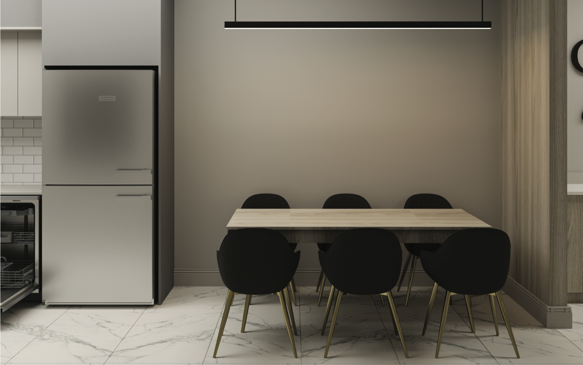 A modern kitchen with a dining area featuring a rectangular wooden table surrounded by six black chairs with gold legs, and a stainless steel refrigerator against a light gray wall.