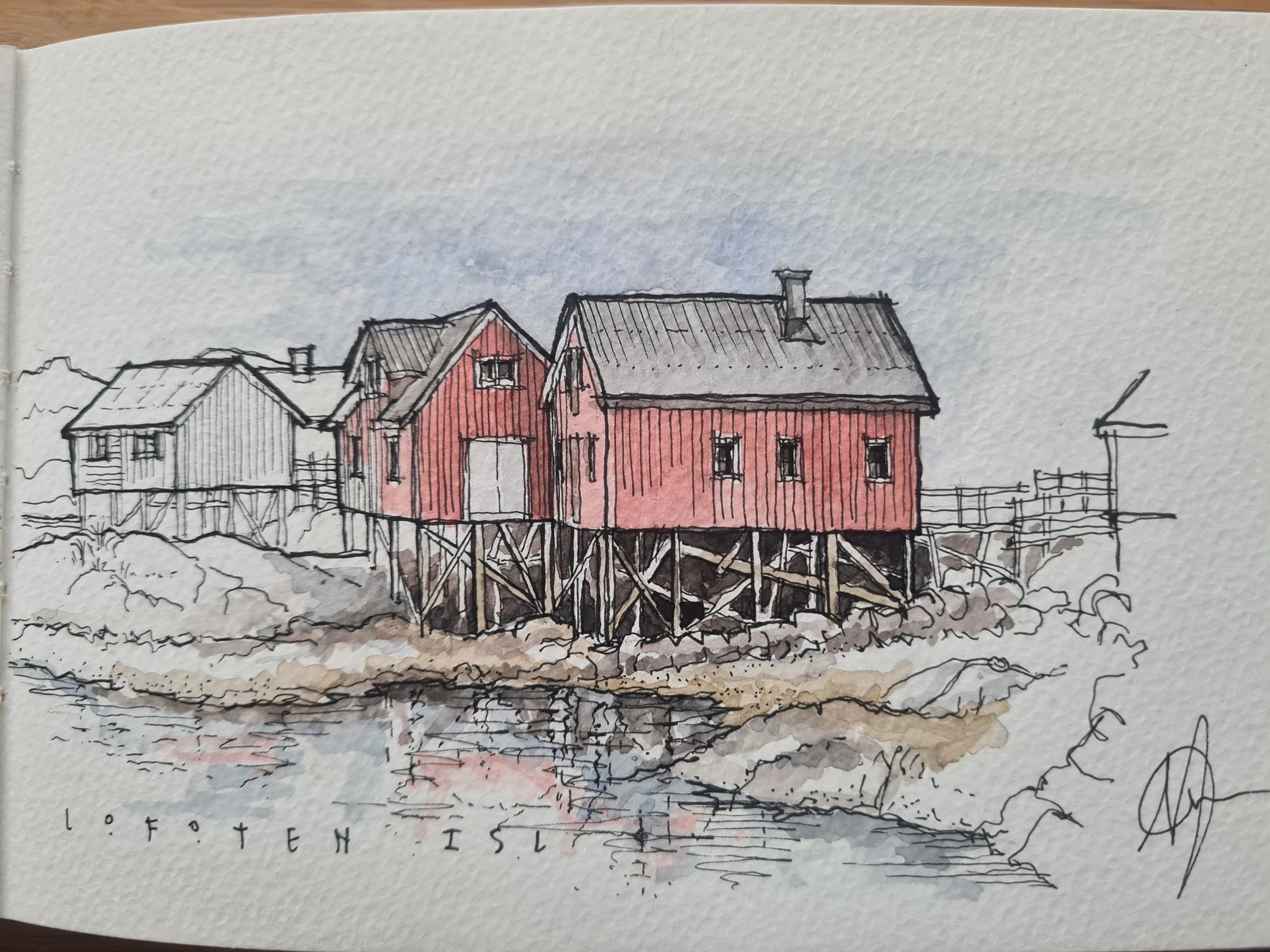 Watercolor sketch of colorful fishing houses on stilts over water, with the text 'Lofoten Island' at the bottom.