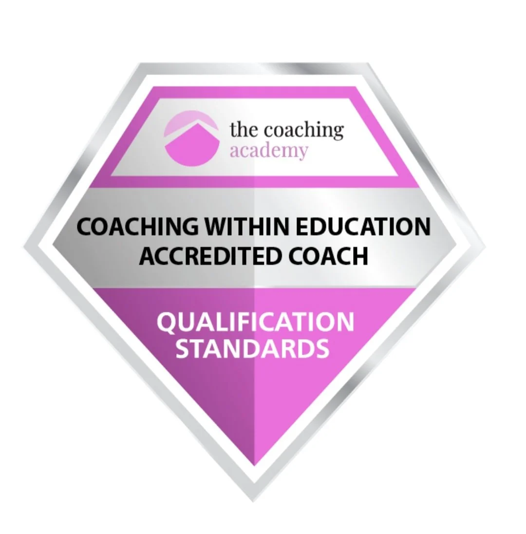Badge of the coaching academy with purple and silver colors, featuring text about coaching standards and qualifications.