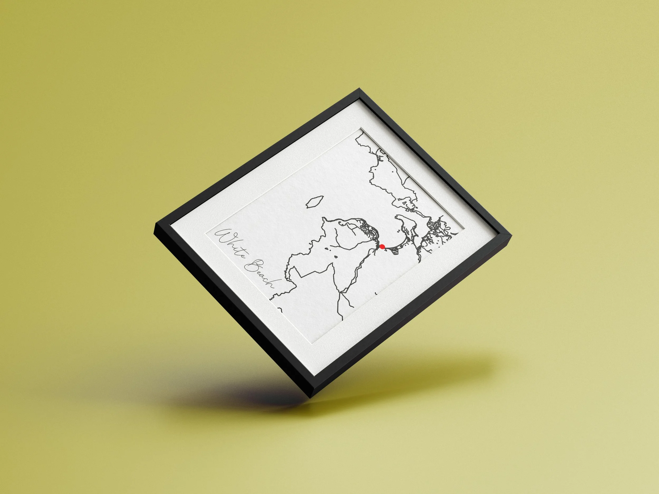 A framed map of the world, with a red dot marking a specific location, tilted on a yellow surface.
