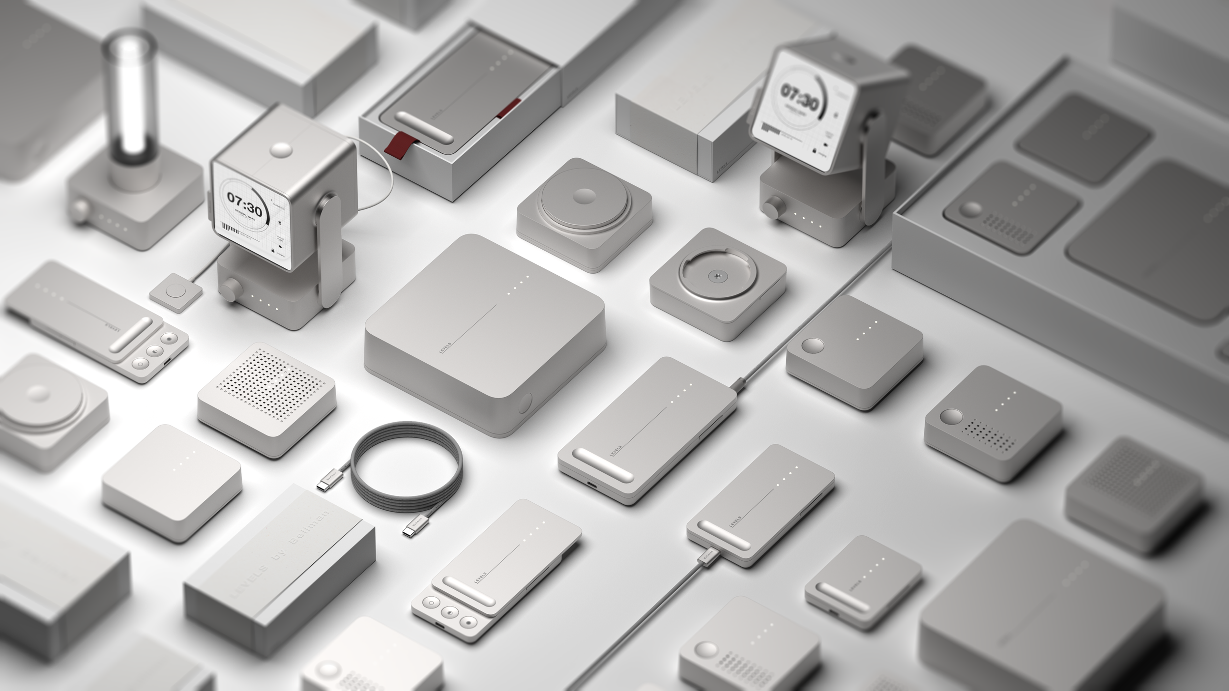 A collection of modern, minimalist electronic gadgets and accessories, predominantly in white and gray, displayed on a flat surface.