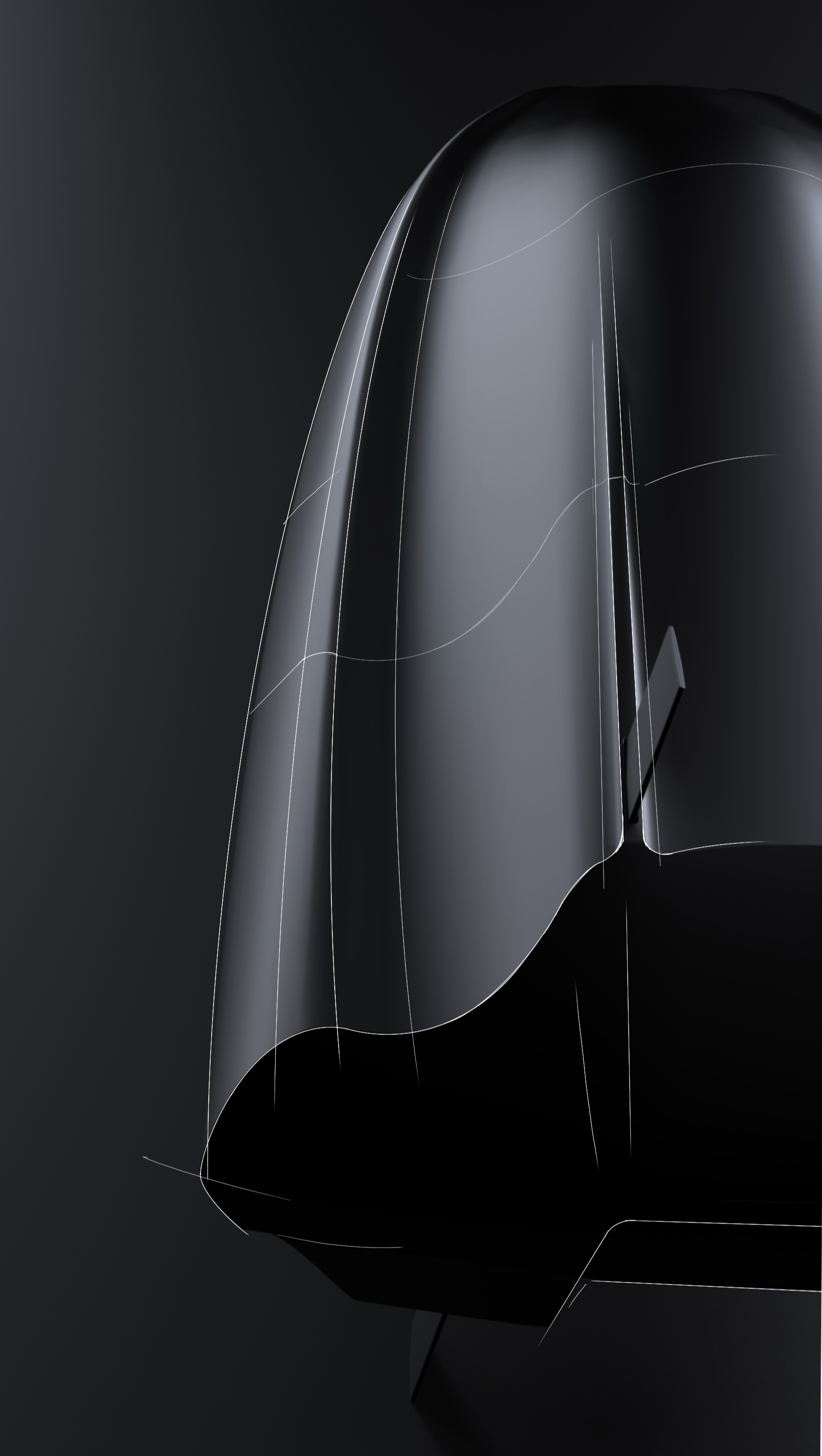 Close-up of a sleek, black, and silver modern toaster on a dark background.