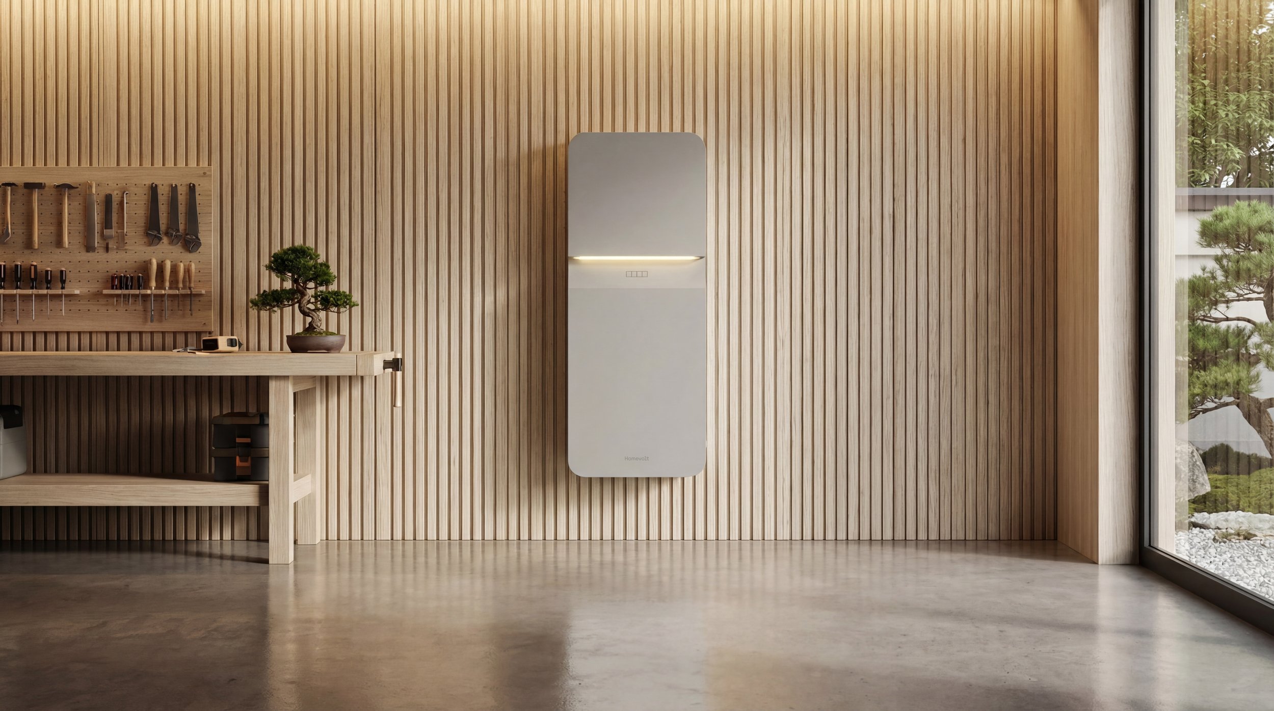 Modern interior with wooden wall paneling, a sleek white appliance on the wall, a wooden workbench with tools, a potted bonsai tree, and large windows overlooking a garden.