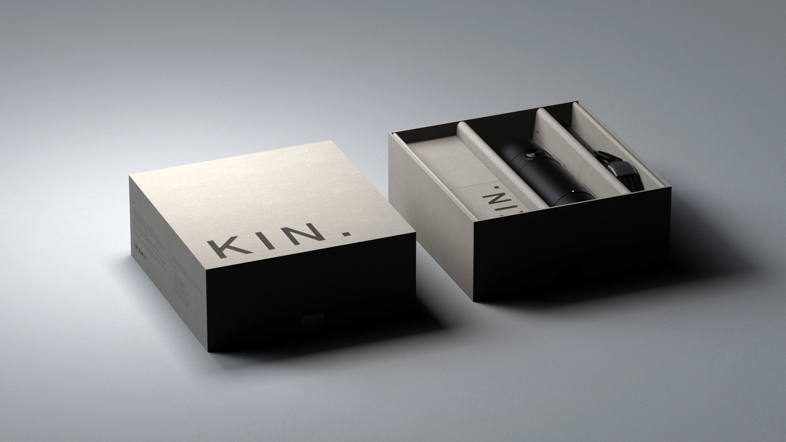 Open boxes displaying a black water bottle and accessories inside, with a closed box labeled 'KIN.' nearby.