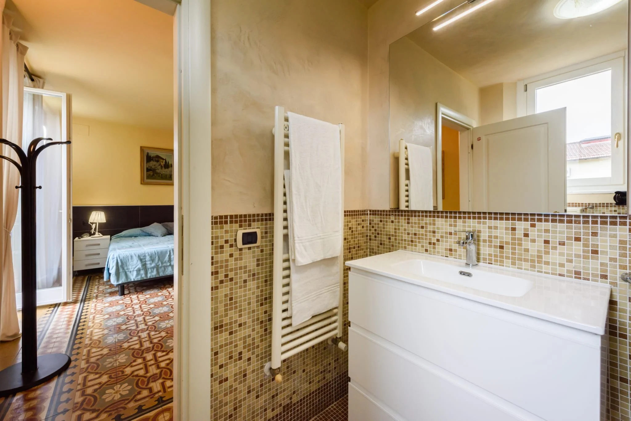 Image showing the toilet of the room with a single triple bed