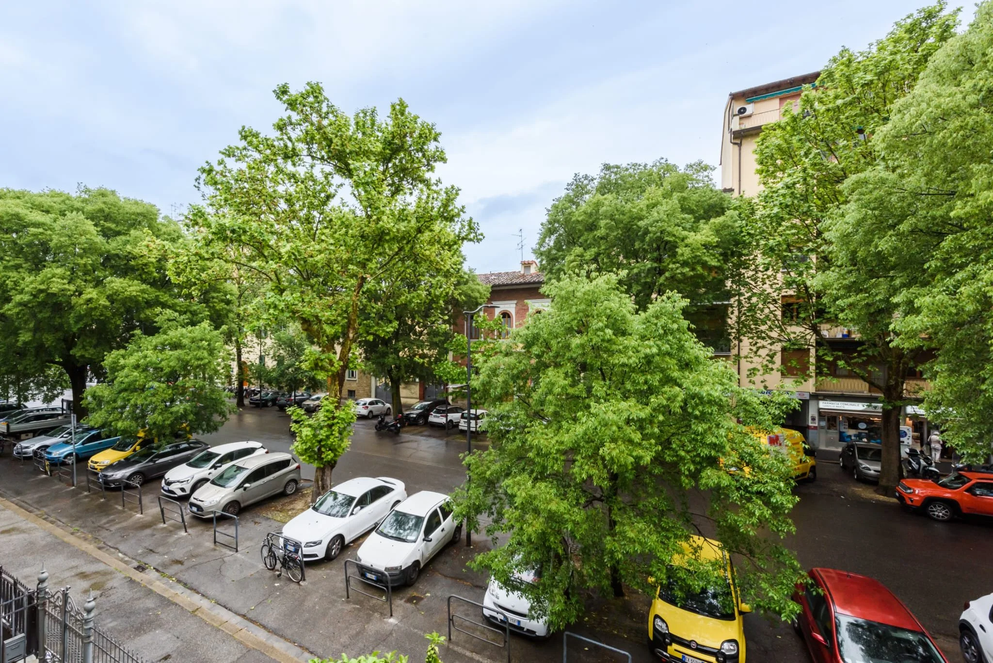 Image showing the view outside with cars parked