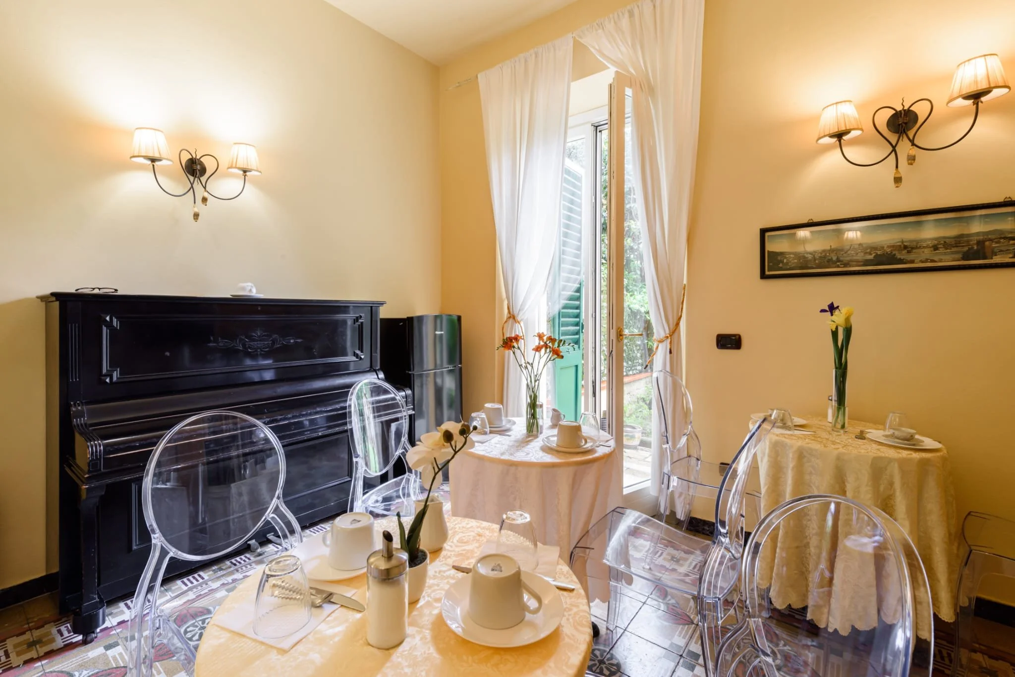 a third image of the dining room; this time showing the piano.