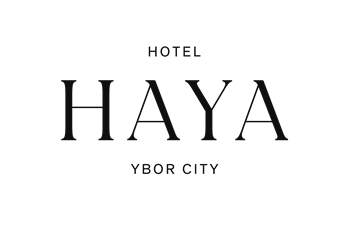 Hotel Haya sign with black background and gray lettering