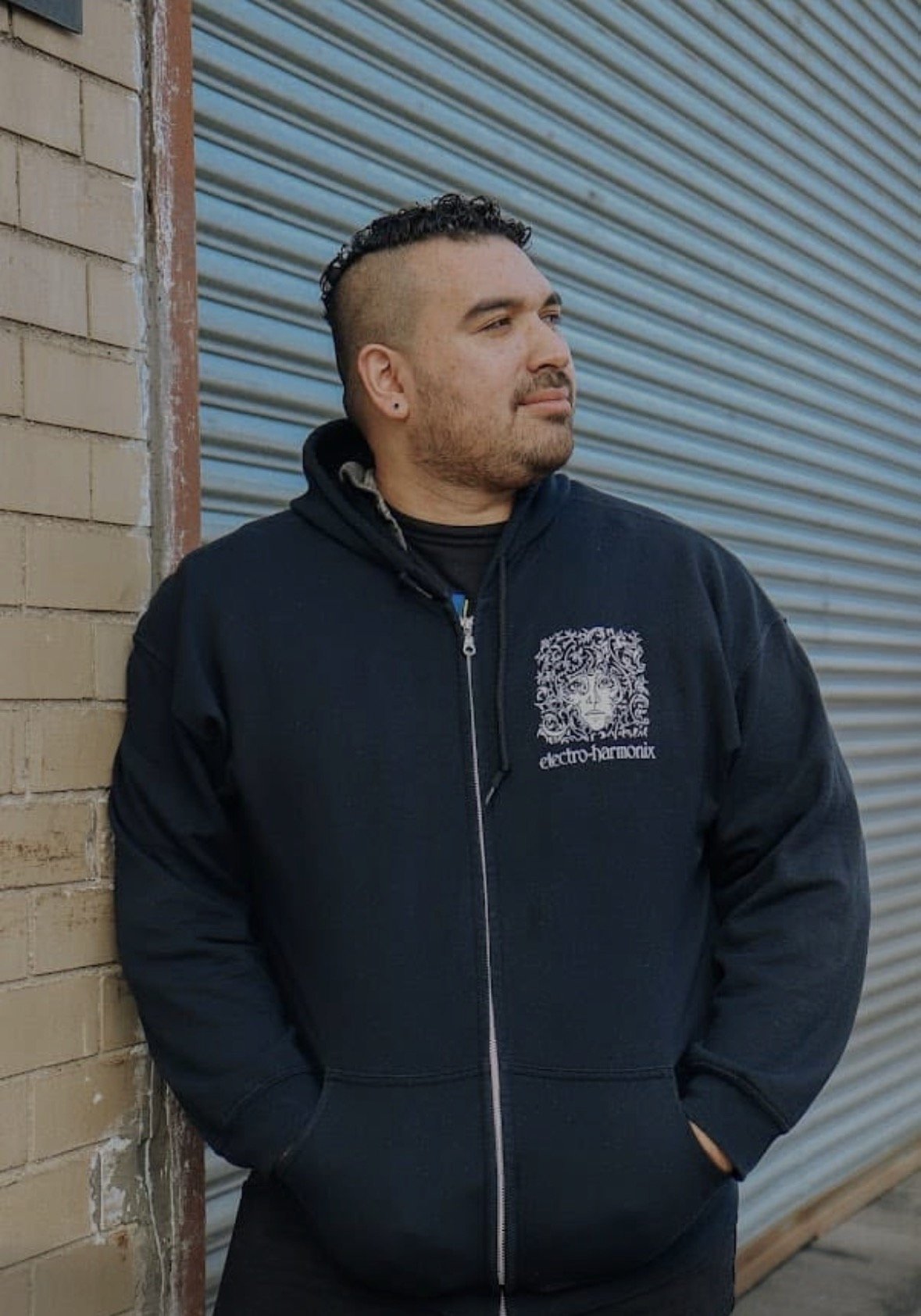 Gabriel Castellar wearing an Electro-Harmonix Hoodie