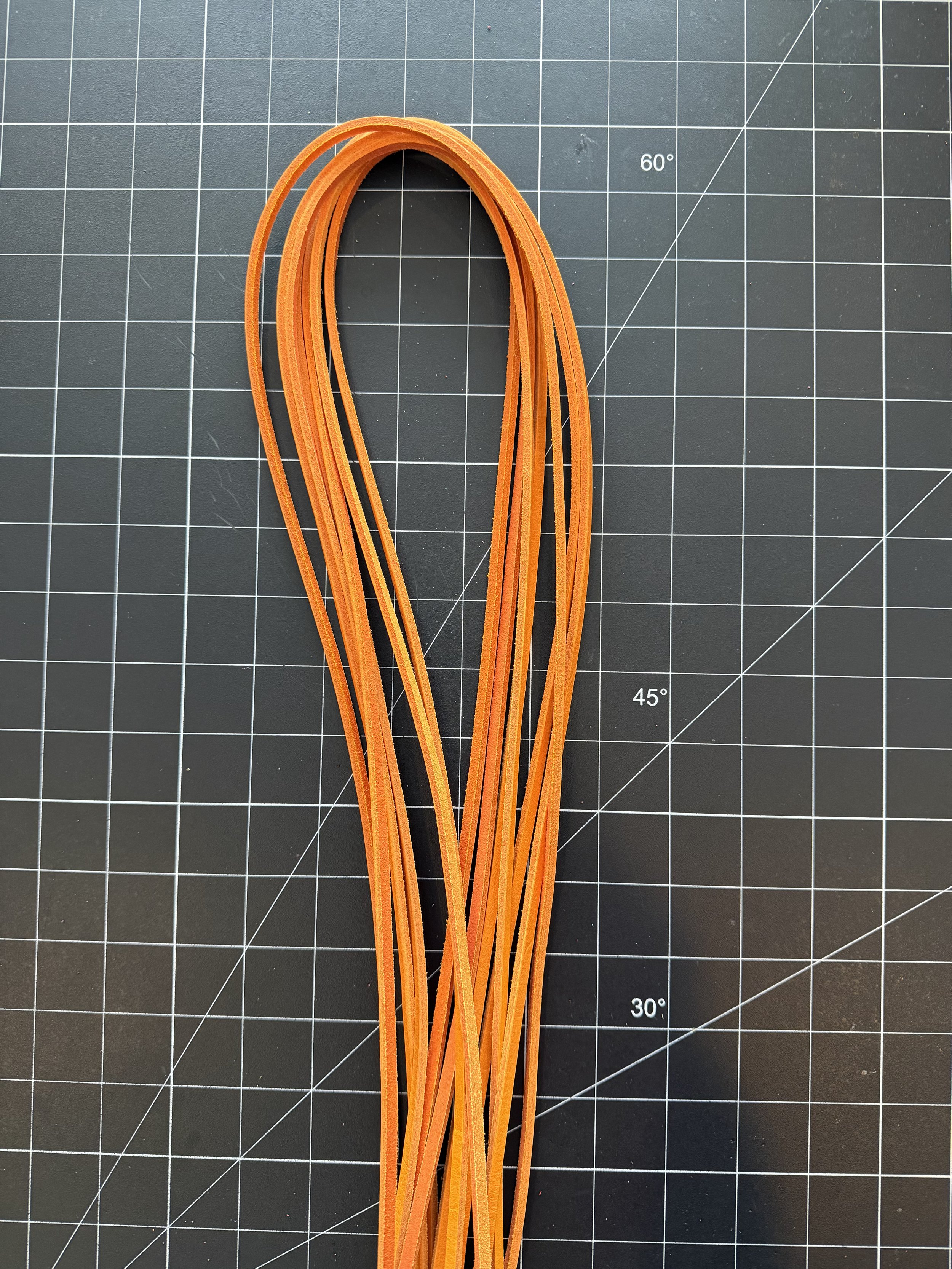 Orange baseball glove lace