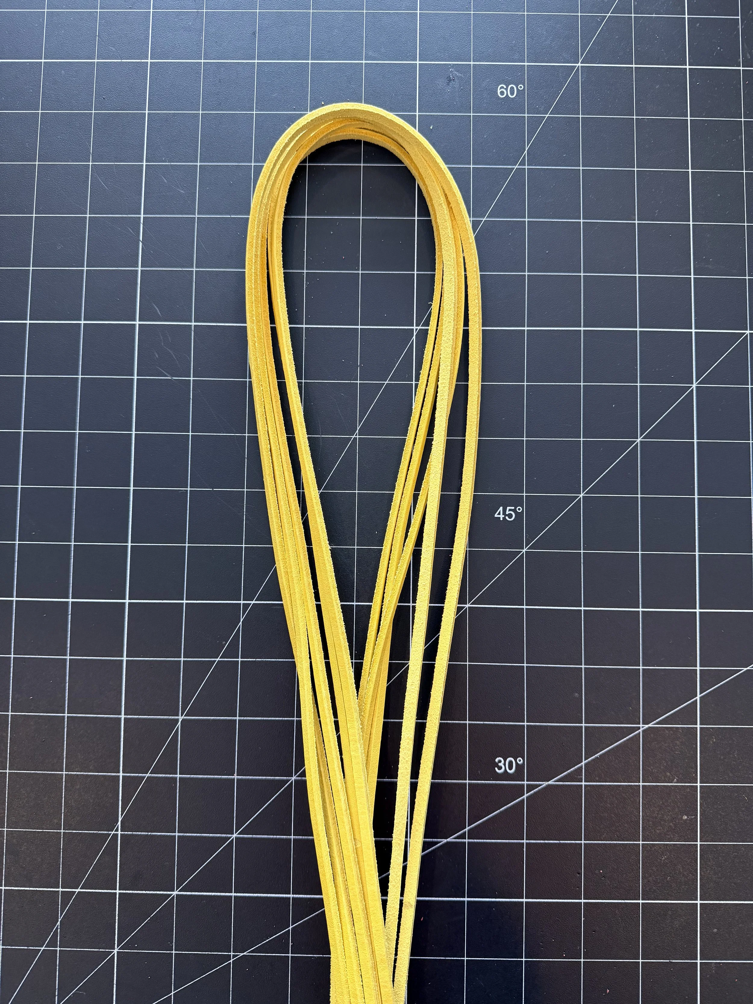 Yellow baseball glove lace