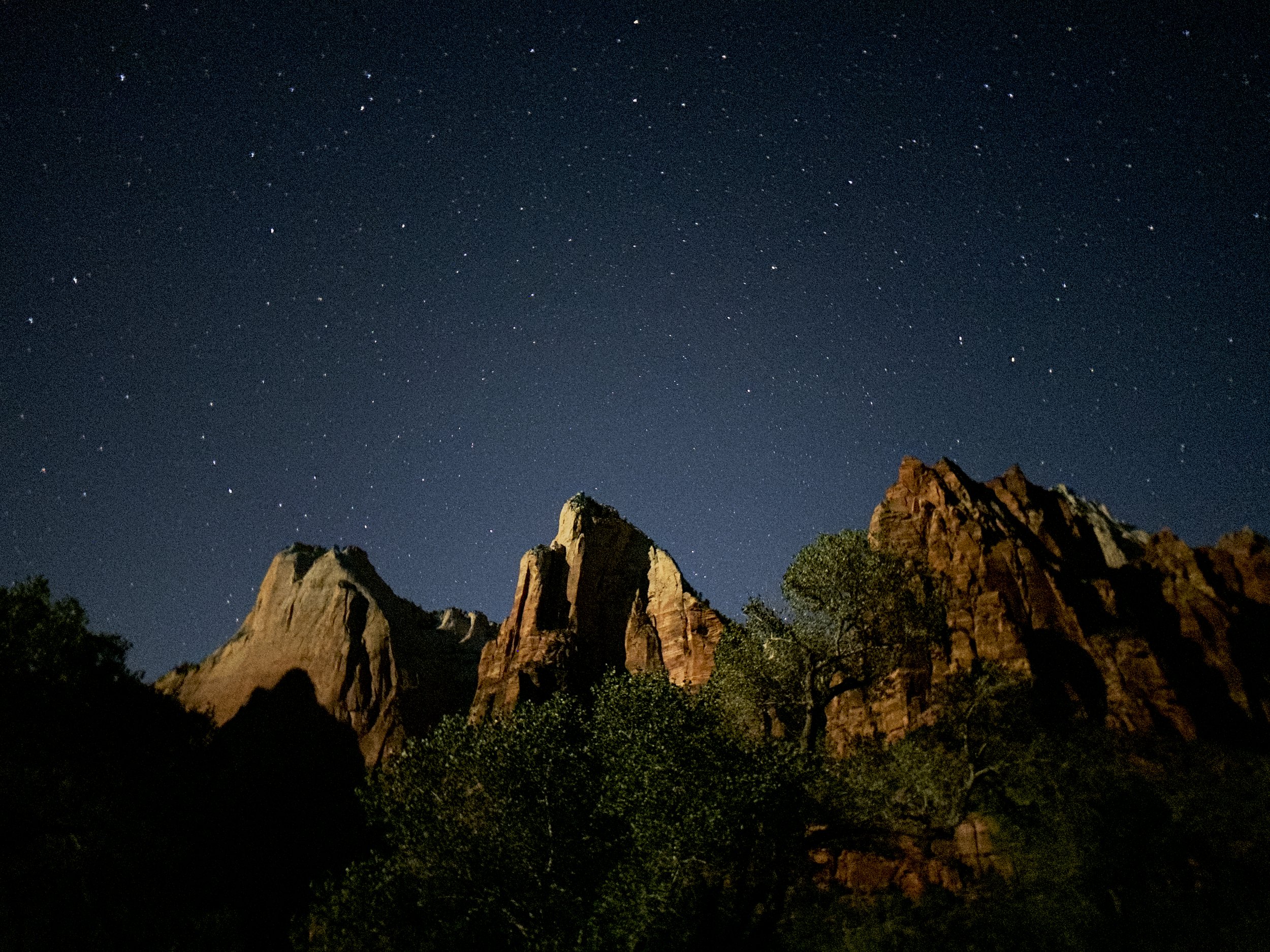 Night sky above the Court of the Patriarchs in Zion National Park