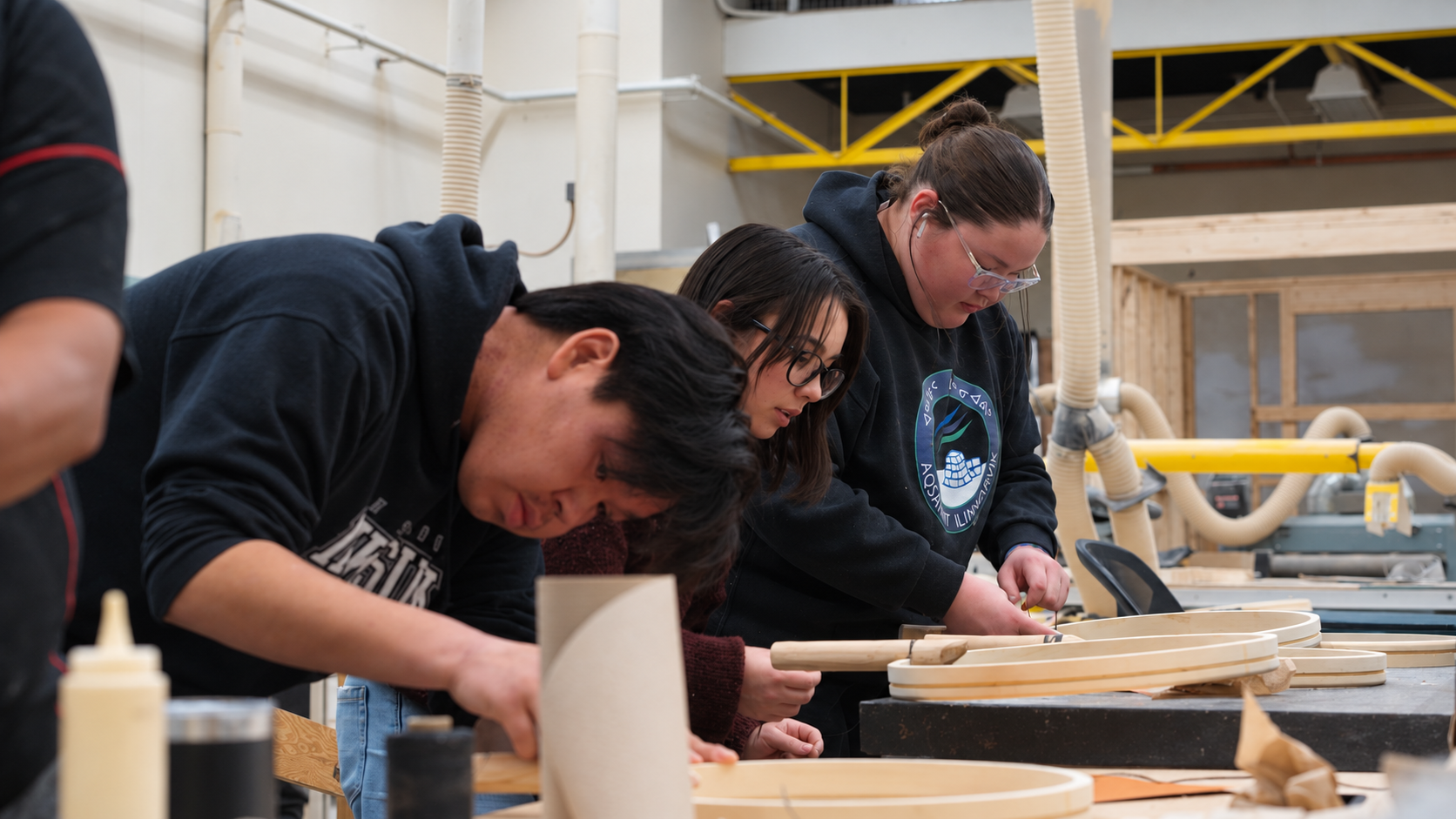 Focused Craftsmanship in the Woodshop.png