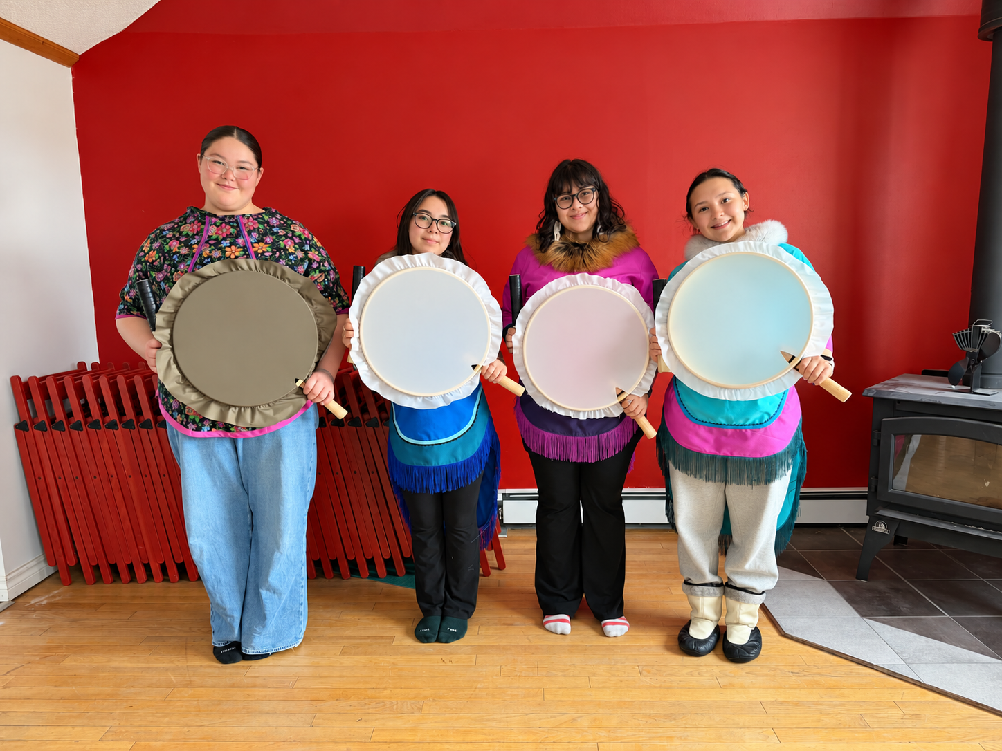 Four Women with Frame Drums.png