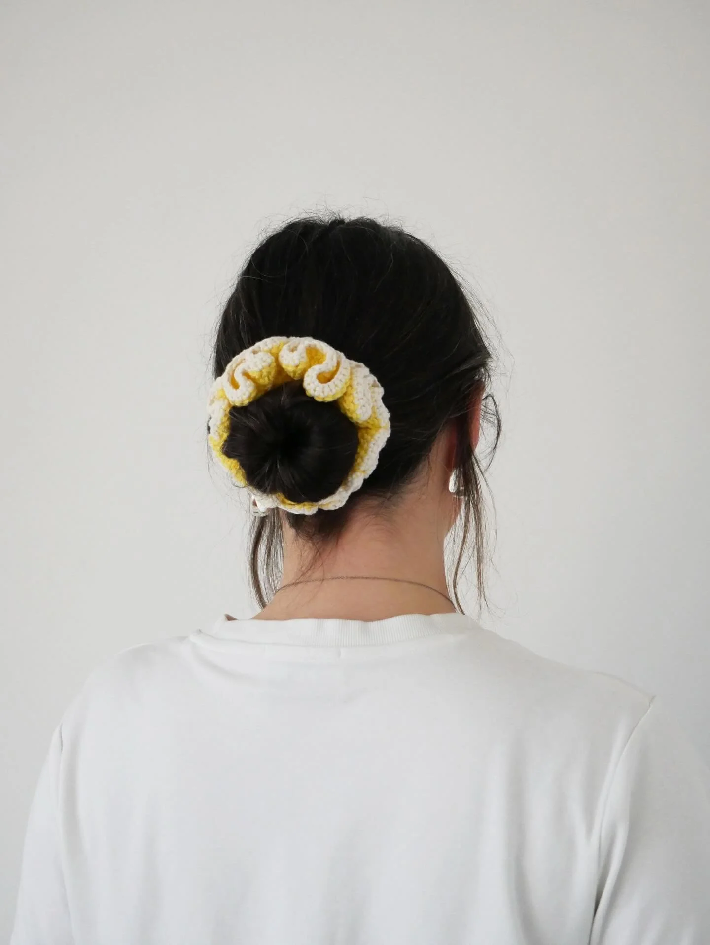 Add a soft pop of colour to any outfit with a crochet scrunchie. Each one is handmade using 100% cotton yarn, with a strong elastic centre so perfect for all hair types.