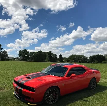 Dodge Challenger Hellcat with tinted windows and windshield.