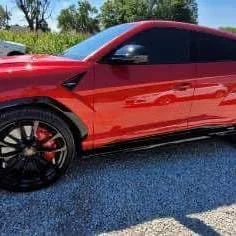 Red SUV with tinted windows.