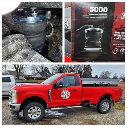 A company Ford Super Duty with Air Lift Airbags.