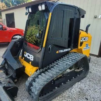 Tinted JCB skid steer with tint on the windows and windshield. 