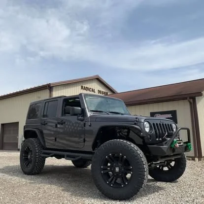 Custom Jeep Wrangler. Lifted with Offroad wheels and tires. Custom Off road bumpers.