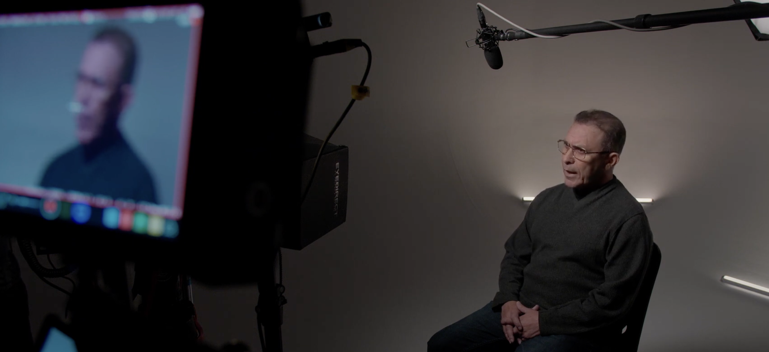 Behind-the-scenes of a community member speaking to the camera