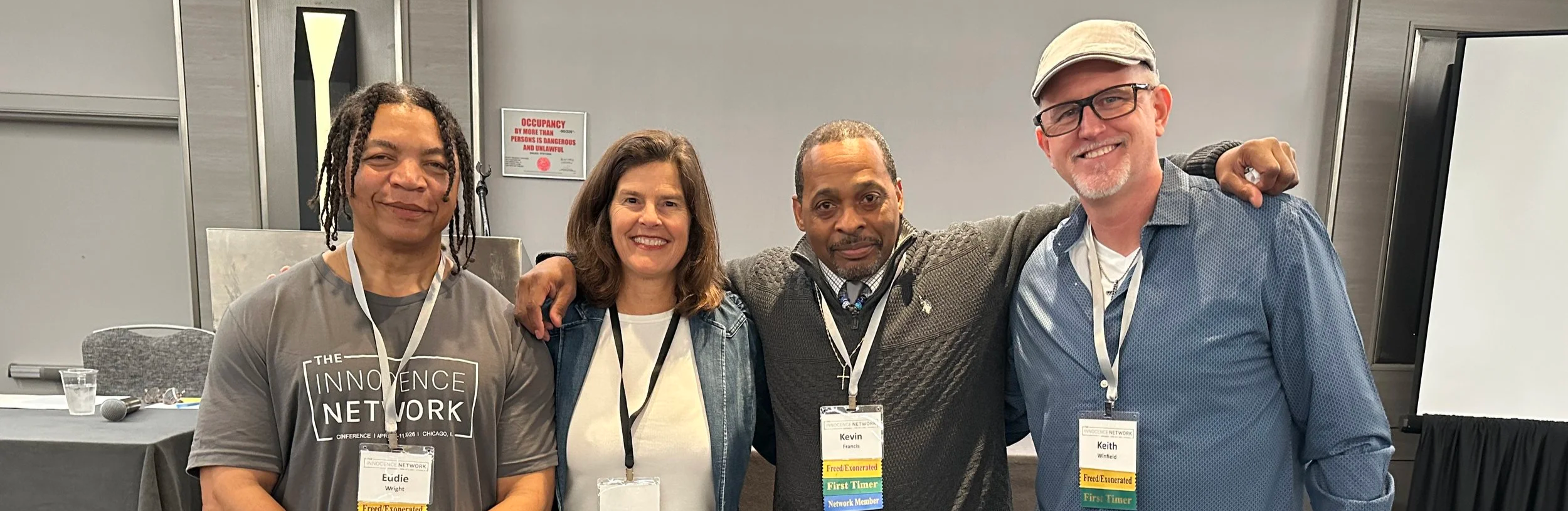 Four community members at an event