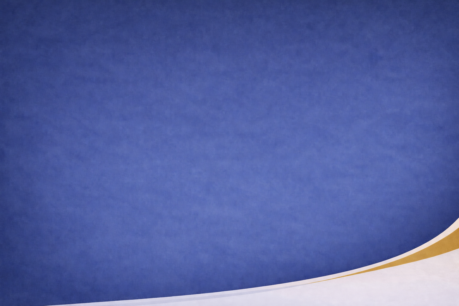 Close-up of a blue and white paper or poster with a curved gold border at the bottom edge.