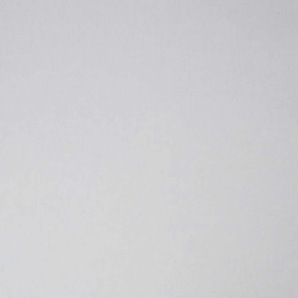 Plain white surface or paper with no visible objects or text