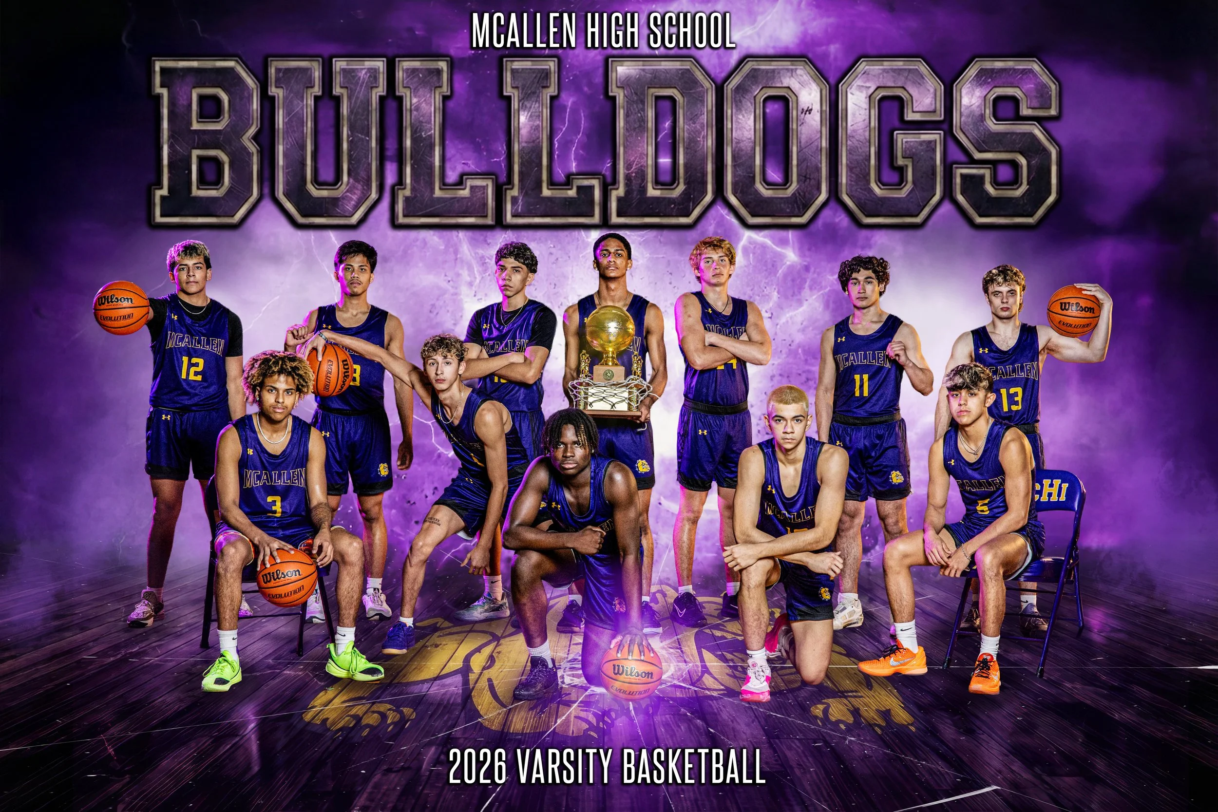 Group of young male basketball players in team uniform posing for a team photo, with a purple and lightning-themed background, in front of a large text that reads 'Build Dogs', with a trophy and basketballs. The text at the top reads 'McAllen High Sc