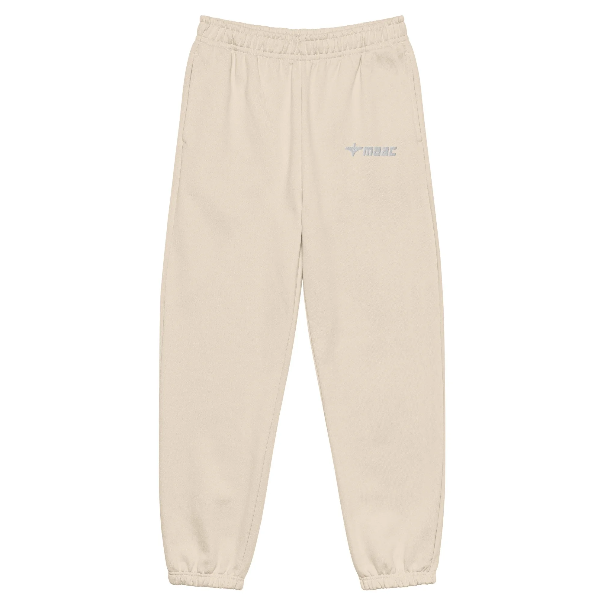 Beige sweatpants with an elastic waistband and cuffs, featuring a small logo on the upper left side.