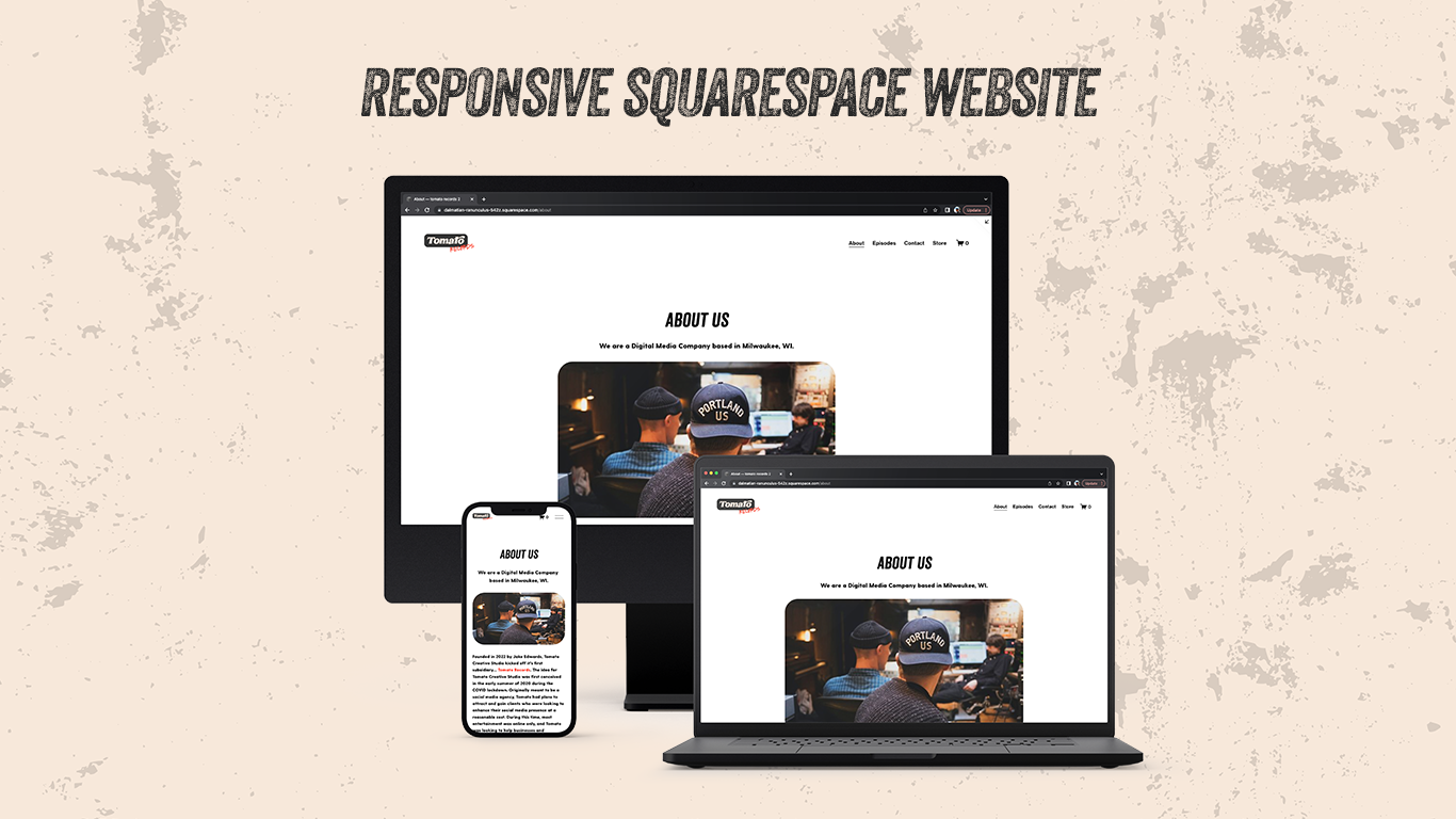 Responsive website displayed on a desktop monitor, laptop, and smartphone, featuring an "About Us" section with a photo of three people working on computers, one wearing a "Portland US" cap.